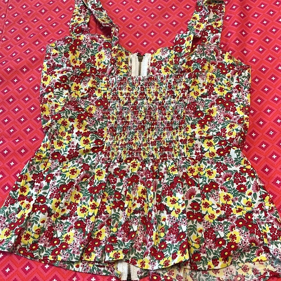 T- shirt is flower print . Size is small and brand is liberty love. - Picture 3 of 3